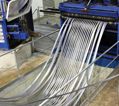 UA looping pit/tension stand combination eliminates the hazardous practice of 'stuffing' cardboard into coils